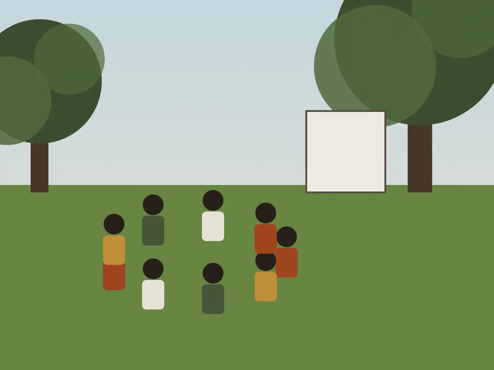 Team sitting in a circle on the lawn